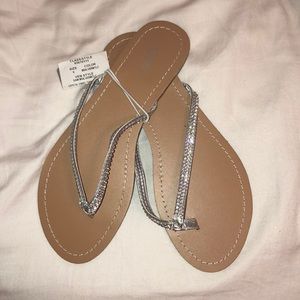 Silver rhinestone flip flops
